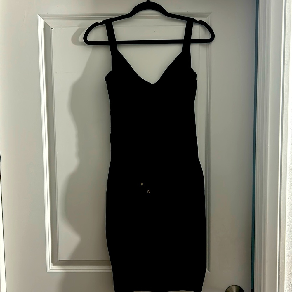 Elegant and sophisticated rich black cocktail dress.
